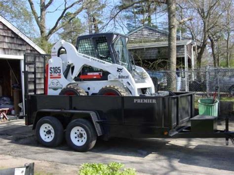 how to tie down a skid steer on a trailer|skid steer trailer loading instructions.